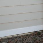 Kannady, right wall after we installed James Hardie fiber cement siding and trim.