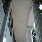 Carr, front porch ceiling after we installed James hardie Panels and trim. Other improvements include Azek cove molding.