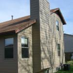 Pritchard, back of house after we installed James Hardie fiber cement siding and trim