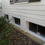 Laughlin, basement windows after we installed James Hardie siding and trim.
